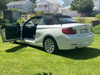 2015 BMW 220i Convertible Luxury Line Steptronic, White Alpine Black Dakota lth with 70000km availab