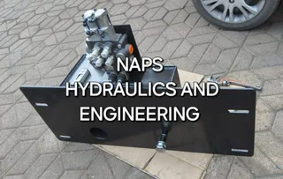 Self-contained hydraulic pump and control valve