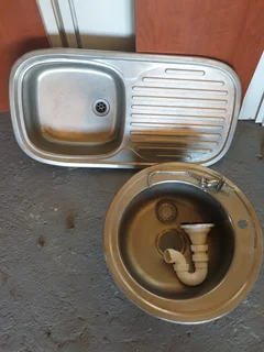sink and prep bowl with a tap