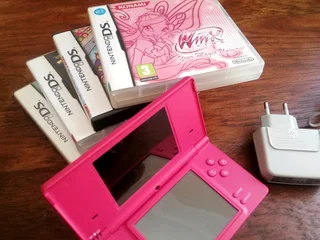 Nintendo DSi and Games (Price Includes Postage)