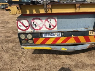 2005 Hendred Fruehauf 6 meter Front and 12 meter Rear Interlinked Flat Bed Trailers with Drop Sides.