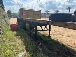 2005 Hendred Fruehauf 6 meter Front and 12 meter Rear Interlinked Flat Bed Trailers with Drop Sides.