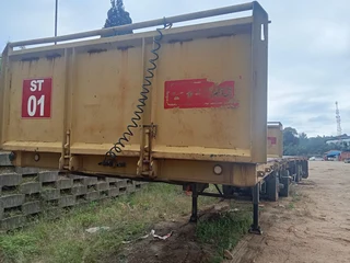 2005 Hendred Fruehauf 6 meter Front and 12 meter Rear Interlinked Flat Bed Trailers with Drop Sides.