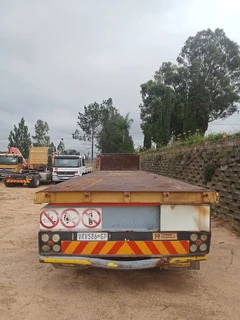 2005 Hendred Fruehauf 6 meter Front and 12 meter Rear Interlinked Flat Bed Trailers with Drop Sides.