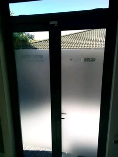 Sandblast vinyl decals to glass