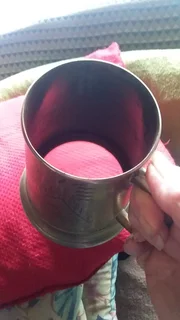 Antique beer mug with engravings and glass bottom Price negotiable