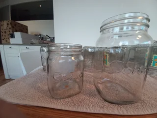 Used console preserve glass jar for sale. Different sizes. (Neg)