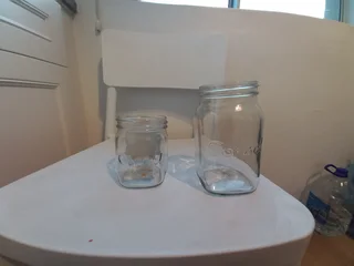 Used console preserve glass jar for sale. Different sizes. (Neg)