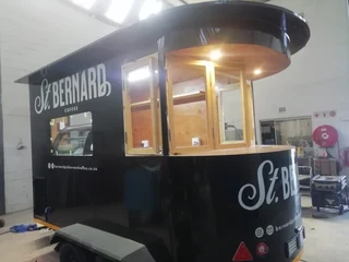 Burger Truck on the move New or pre owned Wheels Food truck with an African Attitude