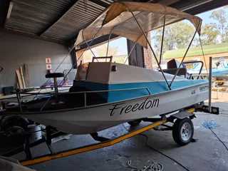 Z CRAFT HUSTLER 4.2MT FWD CONSOLE ON TRAILER