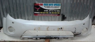 Mitsubishi Outlander front bumper with washer holes