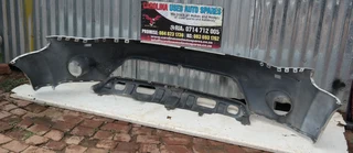 Mitsubishi Outlander front bumper with washer holes