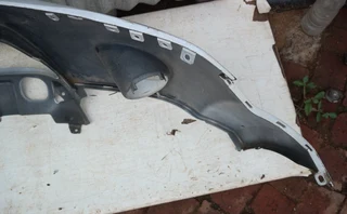 Mitsubishi Outlander front bumper with washer holes