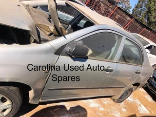 Toyota Corolla Runx sedan for stripping parts (army color)