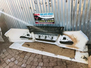 Ford Kuga front bumper with upper grill and left fog light cover