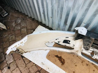 Ford Kuga front bumper with upper grill and left fog light cover