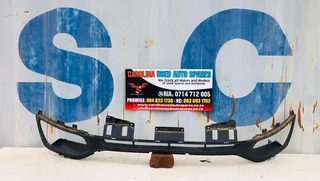 Kia Sportage front bumper foglight cover and grill