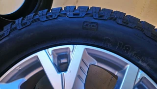ONE BRAND NEW ISUZU D-MAX RIM WITH A TYRE GENERAL GRABER