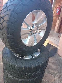 EXCELLENT CONDITION OF RIMS AND TYRES