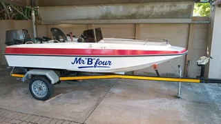 Open riverboat with 40hp Suzuki