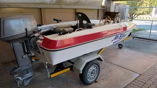 Open riverboat with 40hp Suzuki