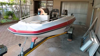 Open riverboat with 40hp Suzuki