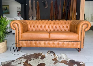 Perfect for your Study or Cigar Lounge Brand New Tan Genuine Leather Two/ Three Seater Chesterfield.