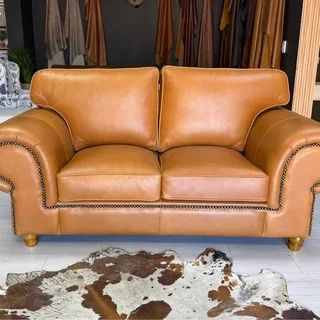 Stunning Genuine Leather Tan Balboa Two Seater available immediately &#64;R18 995.00