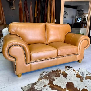 Stunning Genuine Leather Tan Balboa Two Seater available immediately &#64;R18 995.00