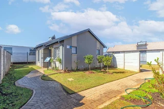 CONTEMPORARY TWO-BEDROOM HOME IN THRIVING DEVELOPMENT