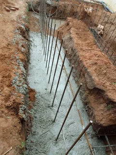 CCA HAND AUGERED PILES  R6000 PER PILE POURED