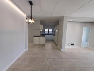 Beautiful two-Bedroom Apartment with Balcony; Built-in Braai, located on the third floor