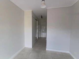 Beautiful two-Bedroom Apartment with Balcony; Built-in Braai, located on the third floor