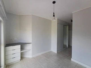 Beautiful 2-Bedroom Apartment with Balcony; Built-in Braai, located on the third floor in