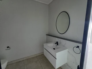 Beautiful 2-Bedroom Apartment with Balcony; Built-in Braai, located on the third floor in