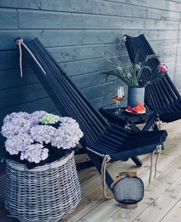 Lantern with glass candle holder inside and rope handle