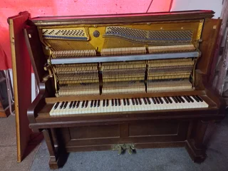 Piano - Ad posted by Bill McAinsh