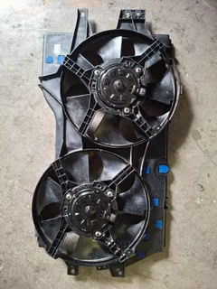 Chrysler 1998 Grand Voyager Fan Shroud with 1 working Fan plus Dorman replacement Shroud with 2 Fans
