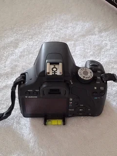 Canon EOS 500D DSLR - Body only with Battery, EOS strap, Canon charger, Manual and lens cap