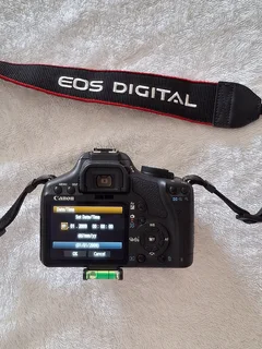Canon EOS 500D DSLR - Body only with Battery, EOS strap, Canon charger, Manual and lens cap