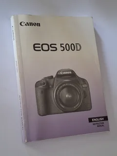 Canon EOS 500D DSLR - Body only with Battery, EOS strap, Canon charger, Manual and lens cap