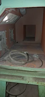 Professional Tone-Blast IC 1200 cabinet with Donaldson dust extractor.