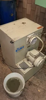Professional Tone-Blast IC 1200 cabinet with Donaldson dust extractor.