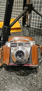 Big price DROP only 650,00 for all : 2camers ,tripod,super cool photografer leather bag,