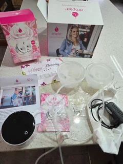 Droplet double electric breast pump with closed system cups