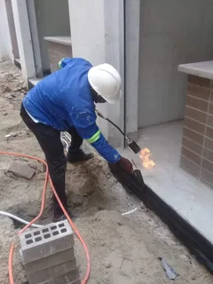 Waterproofing torch-on heavy duty rubberizing