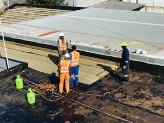 Waterproofing torch-on heavy duty rubberizing