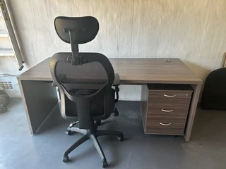 Desk, pedestal, and office chair.