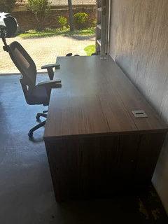 Desk, pedestal, and office chair.