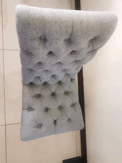 A brand new exquisite gray battoned occasional chair.